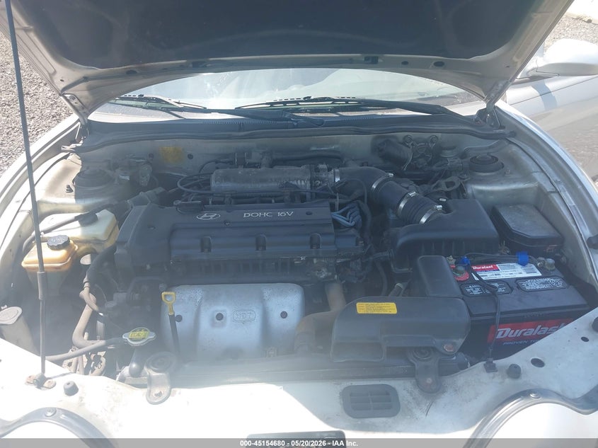 2001 Hyundai Tiburon Base Pkg 1 2 VIN: KMHJG35F81U252602 Lot: 45154680