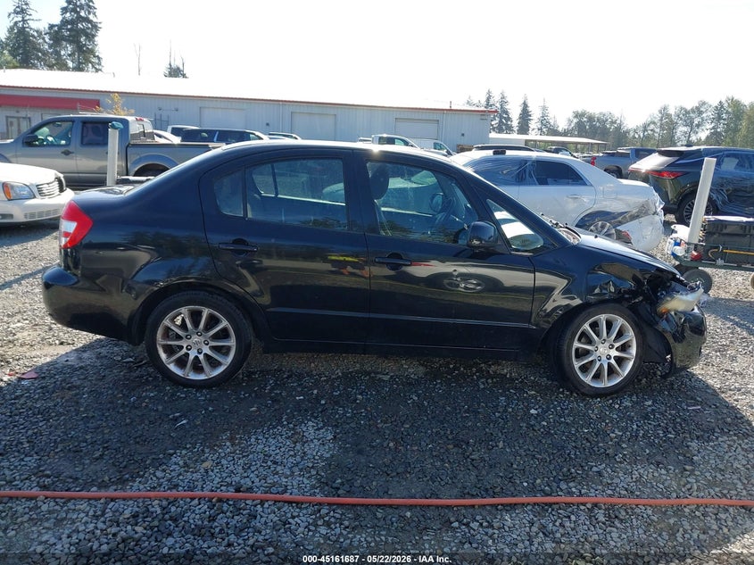 2011 Suzuki Sx4 Le/Le Anniversary Edition VIN: JS2YC5A21B6304810 Lot: 45161687