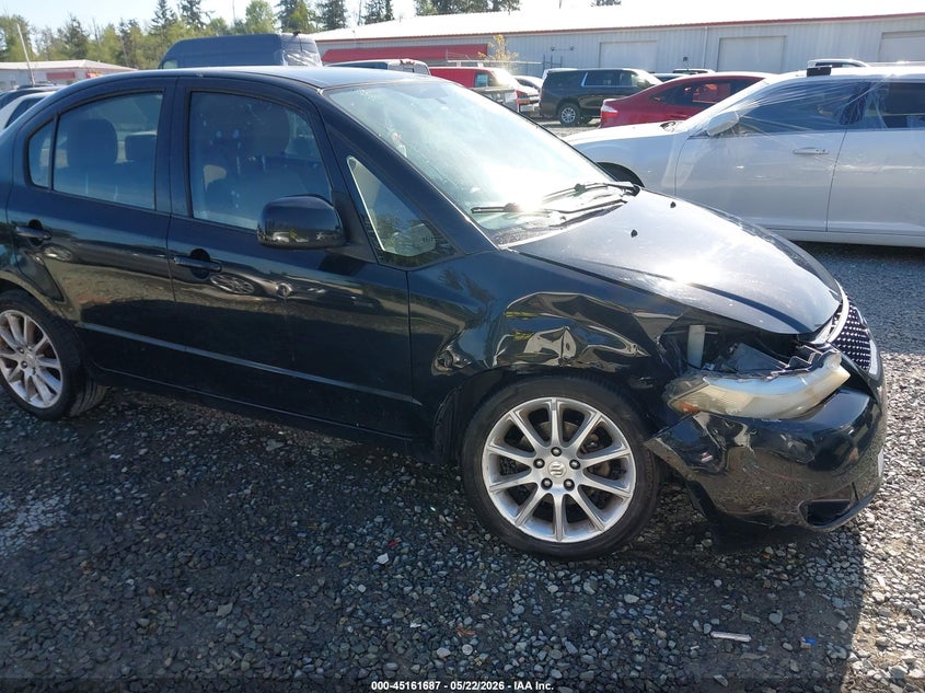 2011 Suzuki Sx4 Le/Le Anniversary Edition VIN: JS2YC5A21B6304810 Lot: 45161687