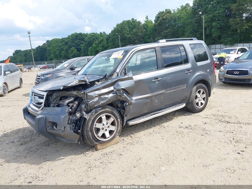 2010 Honda Pilot Touring 5FNYF3H93AB007484 photo 1