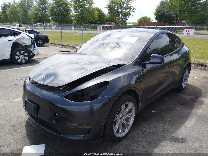 2024 Tesla Model Y 7SAYGDEDXRF016693 photo 1