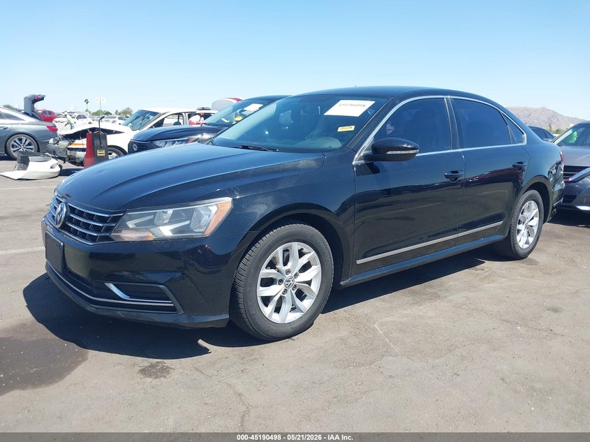2016 Volkswagen Passat 1.8t S 1VWAT7A32GC049557 photo 1