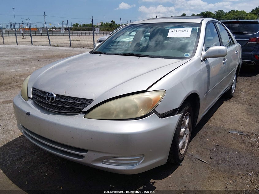 2004 Toyota Camry Le 4T1BE32K84U937201 photo 1