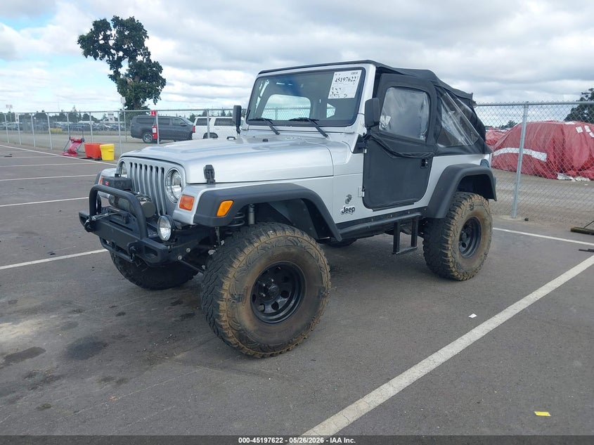 2002 Jeep Wrangler X 1J4FA39S52P770499 photo 1