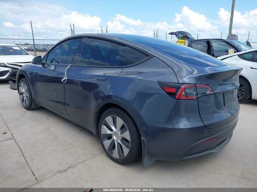 2023 Tesla Model Y Awd/Long Range Dual Motor All-Wheel Drive VIN: 7SAYGAEEXPF941527 Lot: 45202438