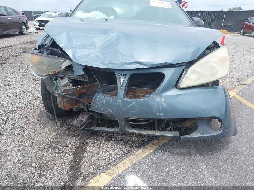 2006 Pontiac G6 VIN: 1G2ZG558464279456 Lot: 45203039