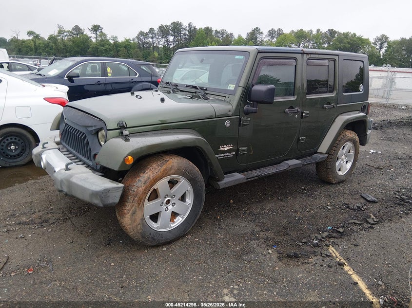 2008 Jeep Wrangler Unlimited Sahara 1J4GA59138L553928 photo 1