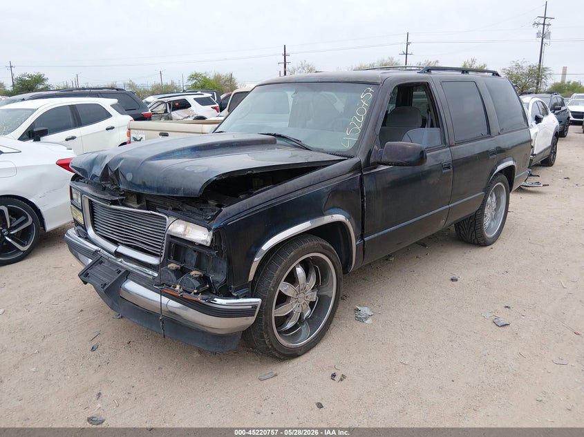 1GKEC13R0XJ812016 1999 Gmc Yukon Sle photo 1