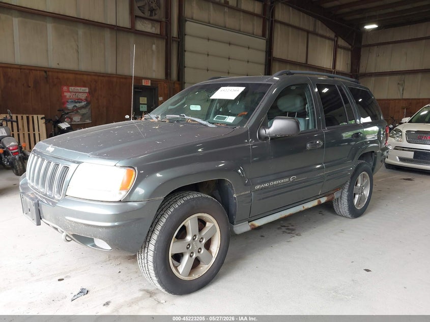1J8GW68J02C219256 2002 JEEP GRAND CHEROKEE OVERLAND photo 1