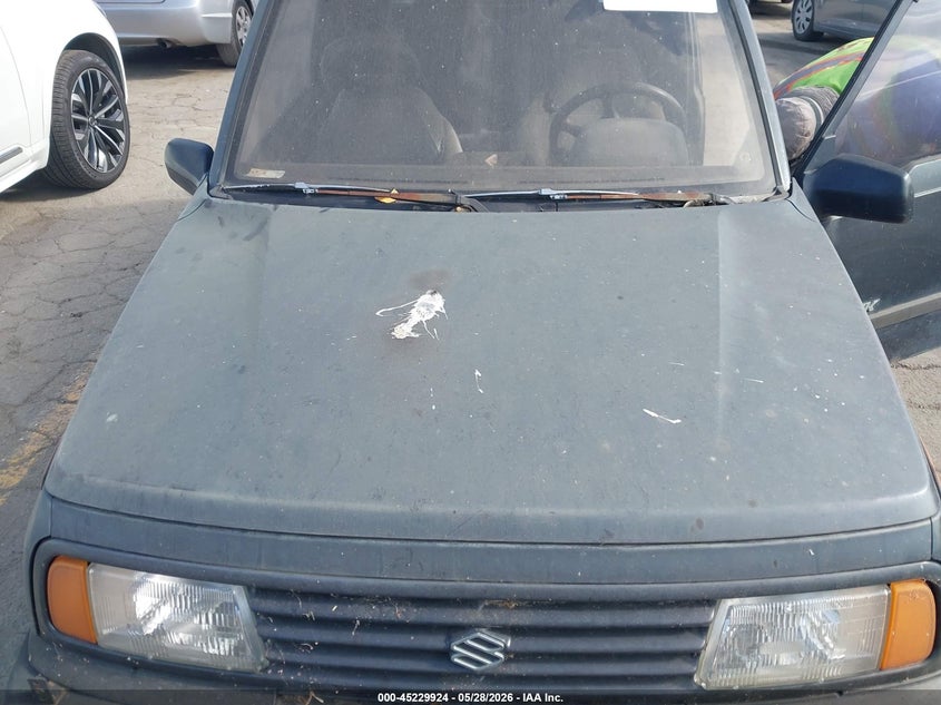1989 Suzuki Sidekick Jx/Jlx VIN: JS4TA01C5K4105659 Lot: 45229924