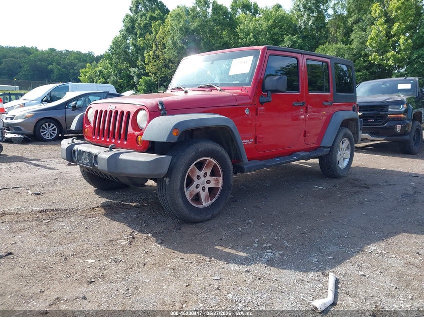 2011 Jeep Wrangler Unlimited Sport 1J4BA3H12BL557461 photo 1