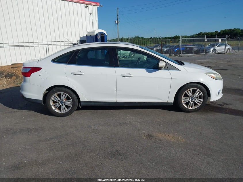 1FAHP3H26CL349209 2012 Ford Focus 2.0 Sel white