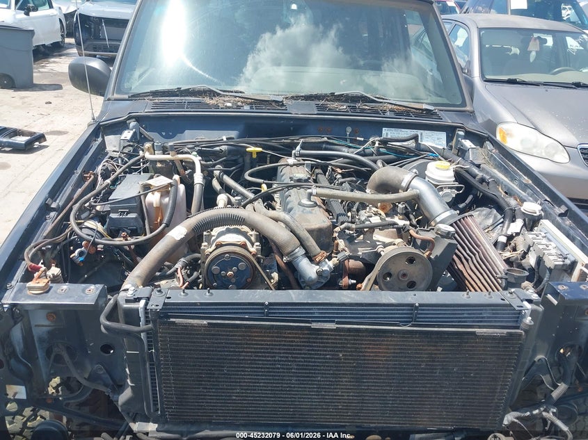 1999 Jeep Cherokee Classic/Sport VIN: 1J4FF68S1XL588415 Lot: 45232079