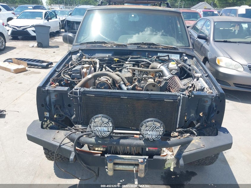 1999 Jeep Cherokee Classic/Sport VIN: 1J4FF68S1XL588415 Lot: 45232079