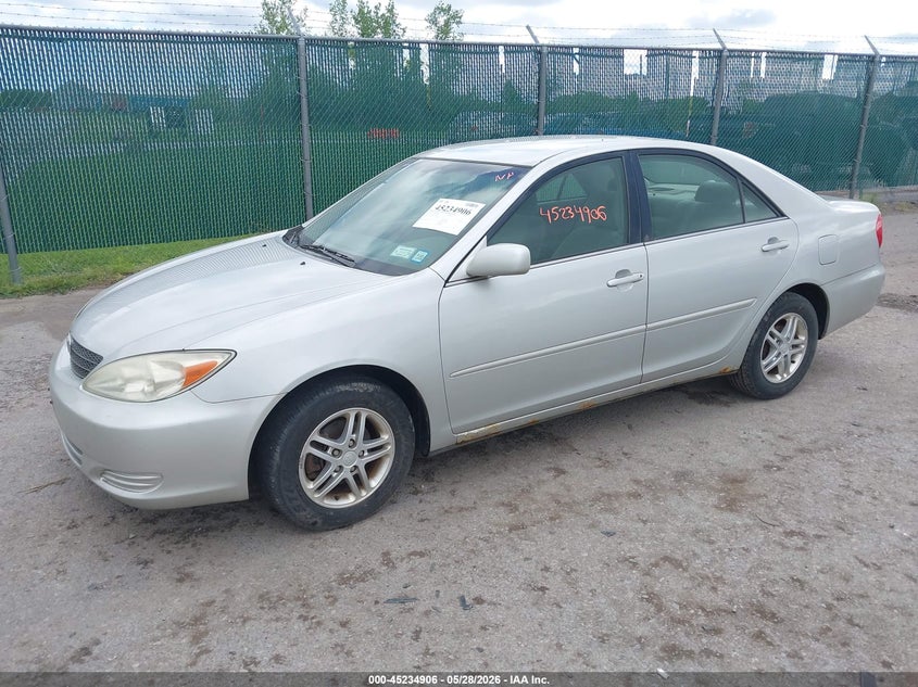 2003 Toyota Camry Le 4T1BE32KX3U708047 photo 1