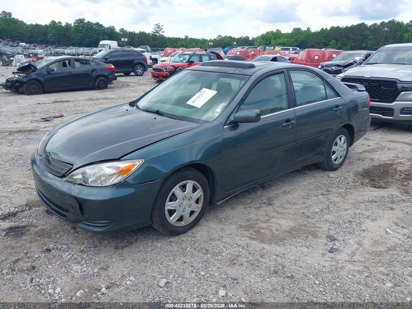 2002 Toyota Camry Le 4T1BE32K32U503121 photo 1