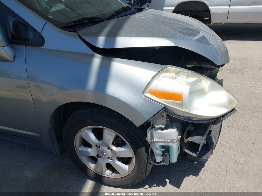 2009 Nissan Versa 1.8Sl VIN: 3N1BC11E89L390669 Lot: 45238393
