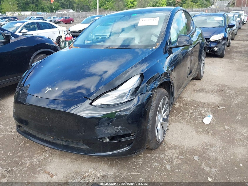 2023 Tesla Model Y Awd/Long Range Dual Motor All-Wheel Drive VIN: 7SAYGAEE2PF766089 Lot: 45247013