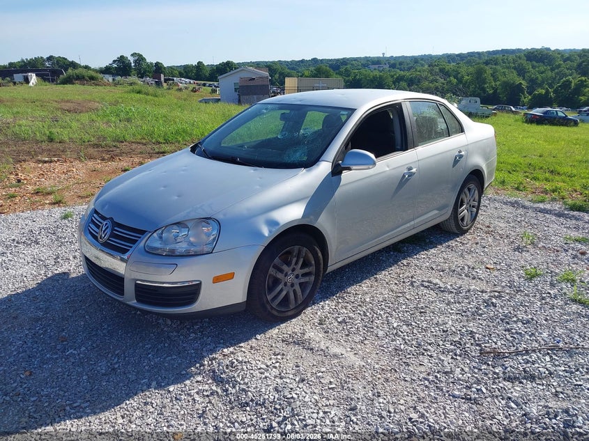 2009 Volkswagen Jetta S 3VWJM71K19M027670 photo 1