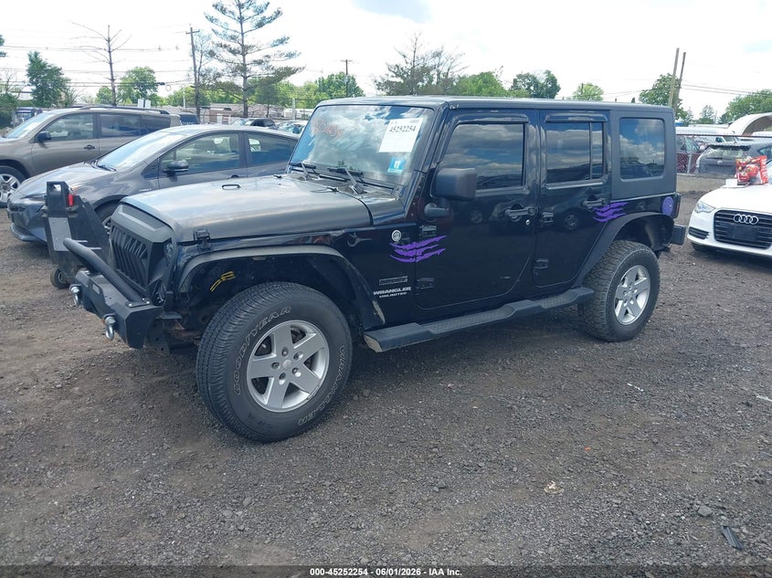 2010 Jeep Wrangler Unlimited Sport 1J4BA3H19AL211082 photo 1