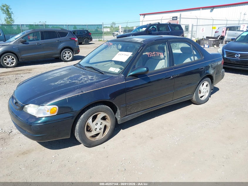 1999 Toyota Corolla Le 2T1BR12E9XC153800 photo 1