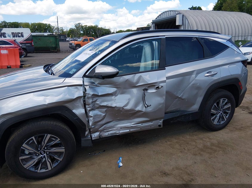 2024 HYUNDAI TUCSON HYBRID auction photo 6