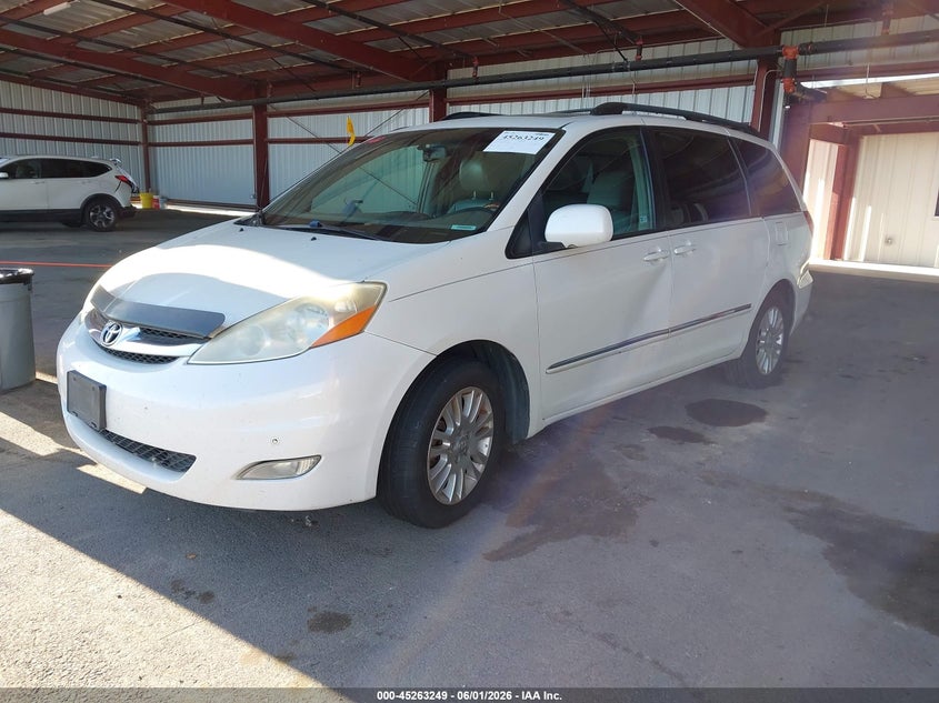 2010 Toyota Sienna Limited 5TDYK4CC8AS304850 photo 1
