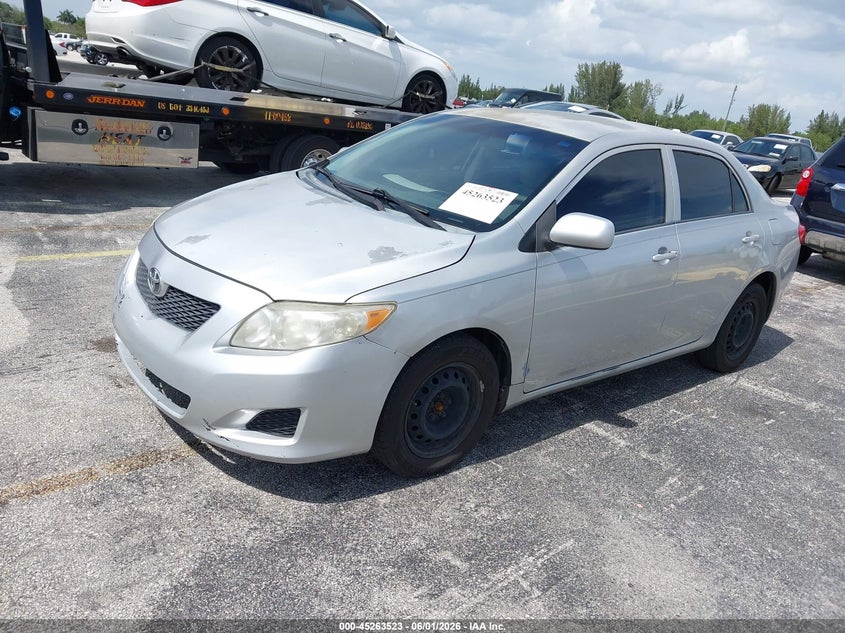 2010 Toyota Corolla Le 1NXBU4EE6AZ315125 photo 1