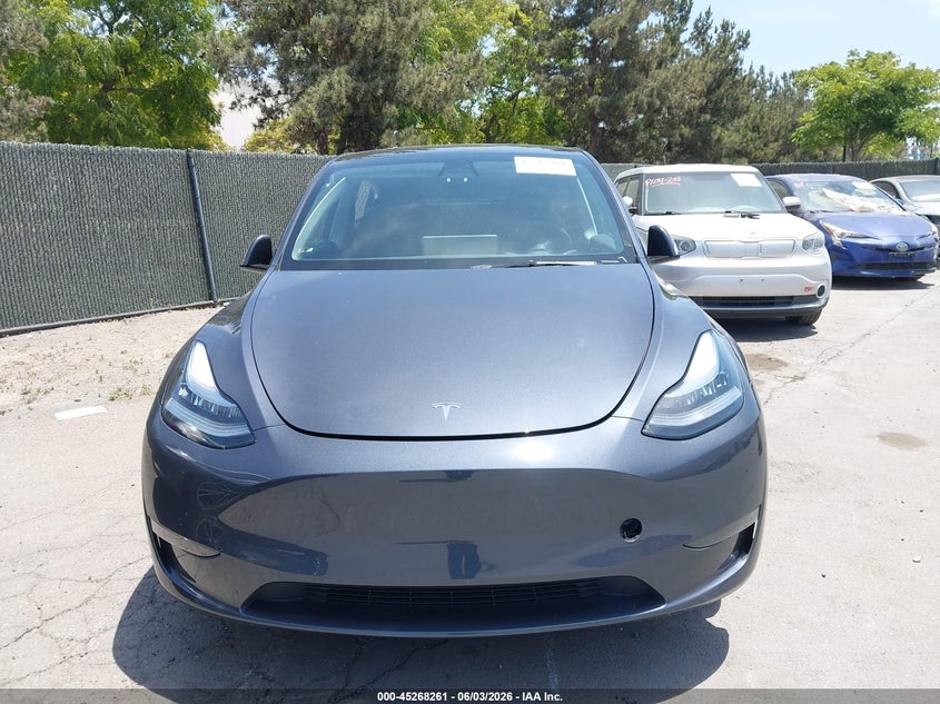 2023 Tesla Model Y Awd/Long Range Dual Motor All-Wheel Drive VIN: 7SAYGDEE3PA057217 Lot: 45268261