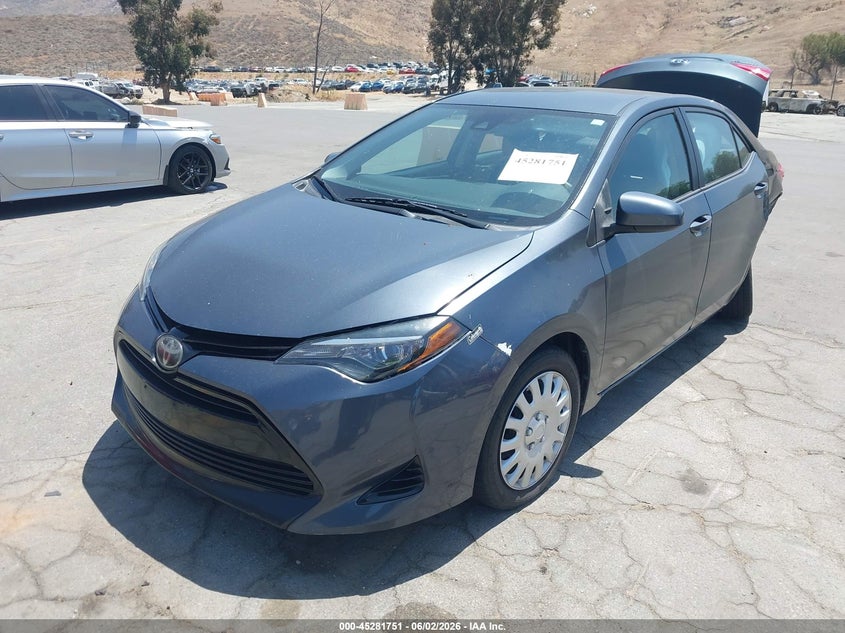 2017 Toyota Corolla Le 5YFBURHE3HP713686 photo 1
