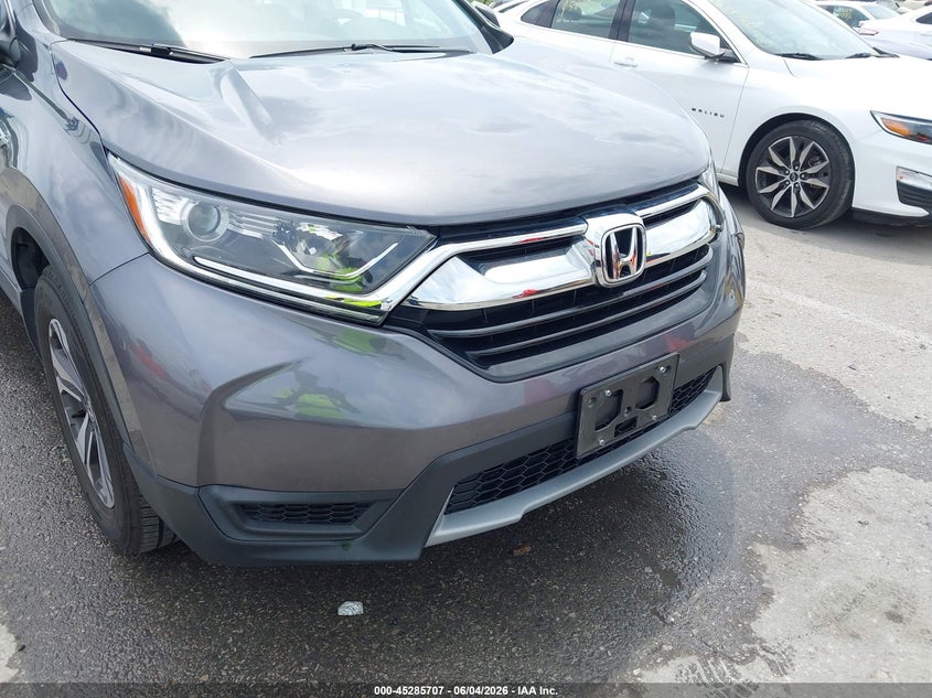 2018 Honda Cr-V Lx VIN: 5J6RW6H39JL003013 Lot: 45285707