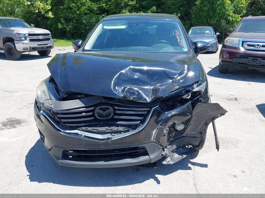 2016 Mazda Cx-5 Touring VIN: JM3KE2CY7G0799820 Lot: 45299764