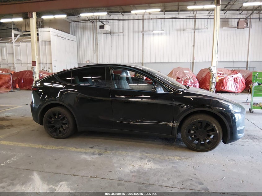 2023 Tesla Model Y Awd/Long Range Dual Motor All-Wheel Drive VIN: 7SAYGDEEXPF885896 Lot: 45300125