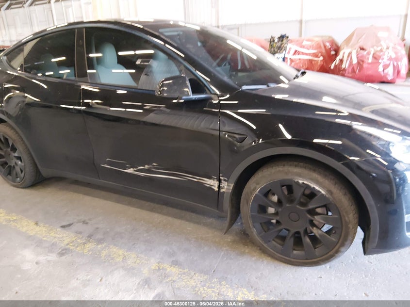 2023 Tesla Model Y Awd/Long Range Dual Motor All-Wheel Drive VIN: 7SAYGDEEXPF885896 Lot: 45300125