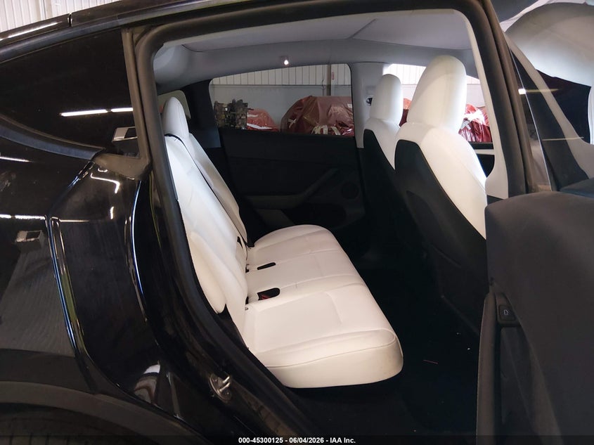 2023 Tesla Model Y Awd/Long Range Dual Motor All-Wheel Drive VIN: 7SAYGDEEXPF885896 Lot: 45300125