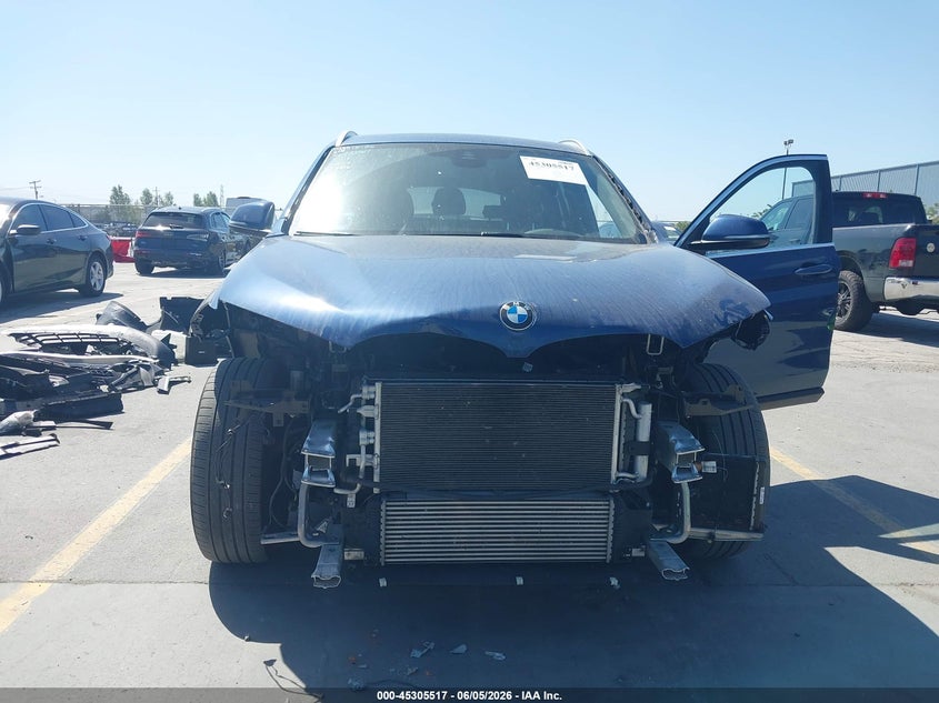 2021 BMW X1 2.0L I-4 DI, DOHC, V(VIN: WBXJG9C09M5T06674