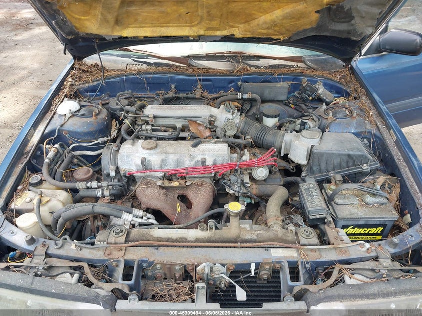 1990 Mazda 626 Dx/Lx VIN: JM1GD2220L1812877 Lot: 45309494