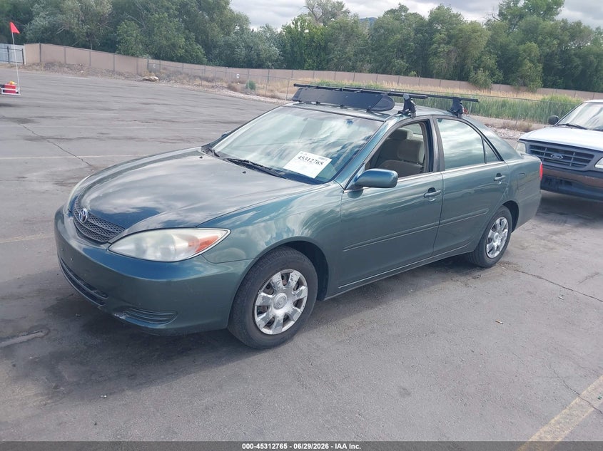 2004 Toyota Camry Le JTDBE32K140275344 photo 1