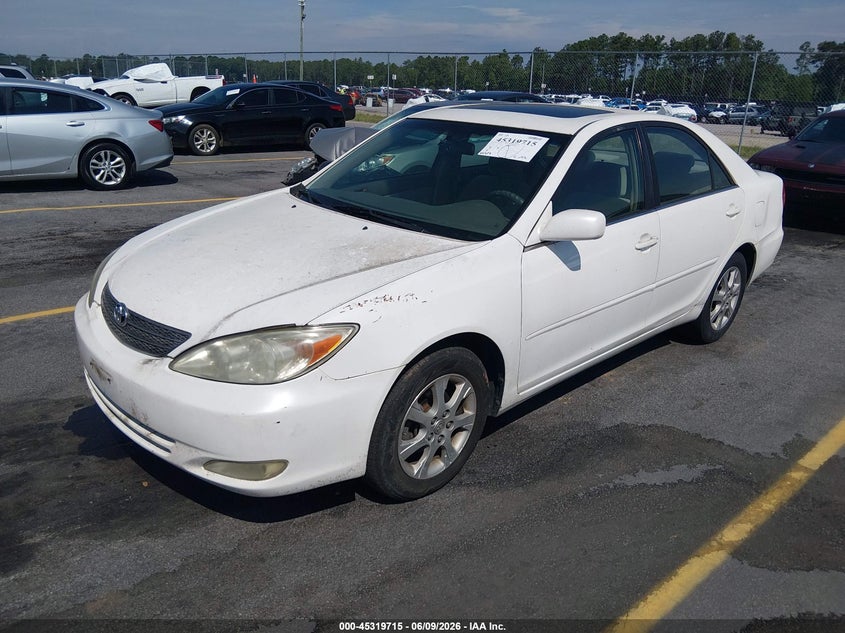 2004 Toyota Camry Le JTDBE32K540279929 photo 1