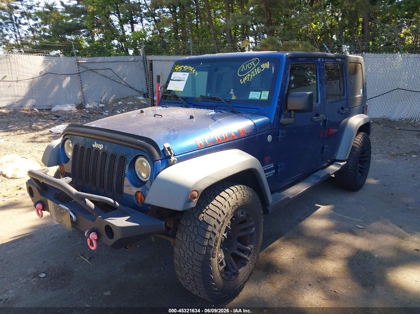 2010 Jeep Wrangler Unlimited Sport 1J4HA3H11AL181375 photo 1
