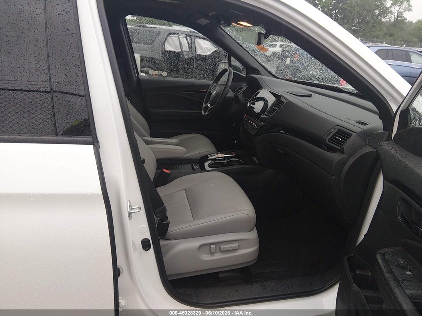 VIN 5FNYF8H01PB024453 2023 HONDA PASSPORT AWD ELITE