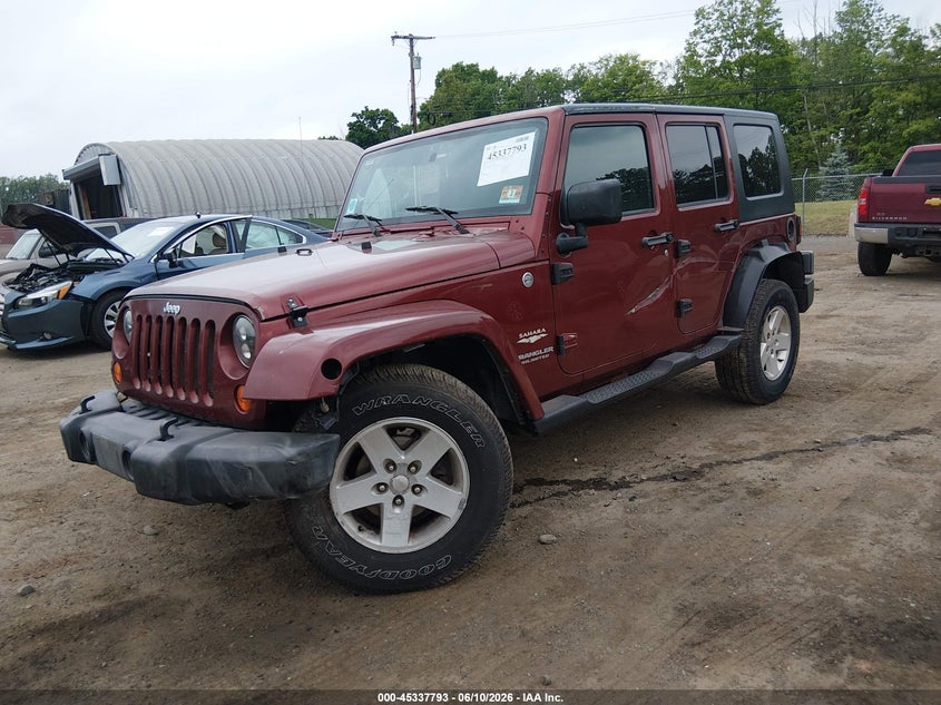 2007 Jeep Wrangler Unlimited Sahara 1J4GA59127L156564 photo 1
