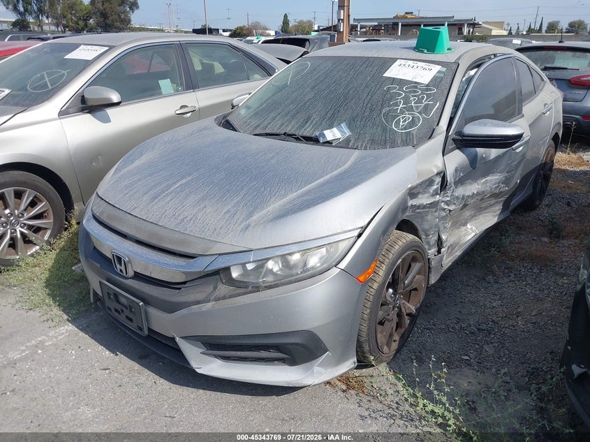 2HGFC2F59JH571596 2018 Honda Civic Lx photo 1