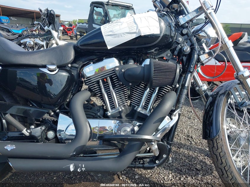 2009 Harley-Davidson Xl1200 C VIN: 1HD1CT3179K434028 Lot: 45348168