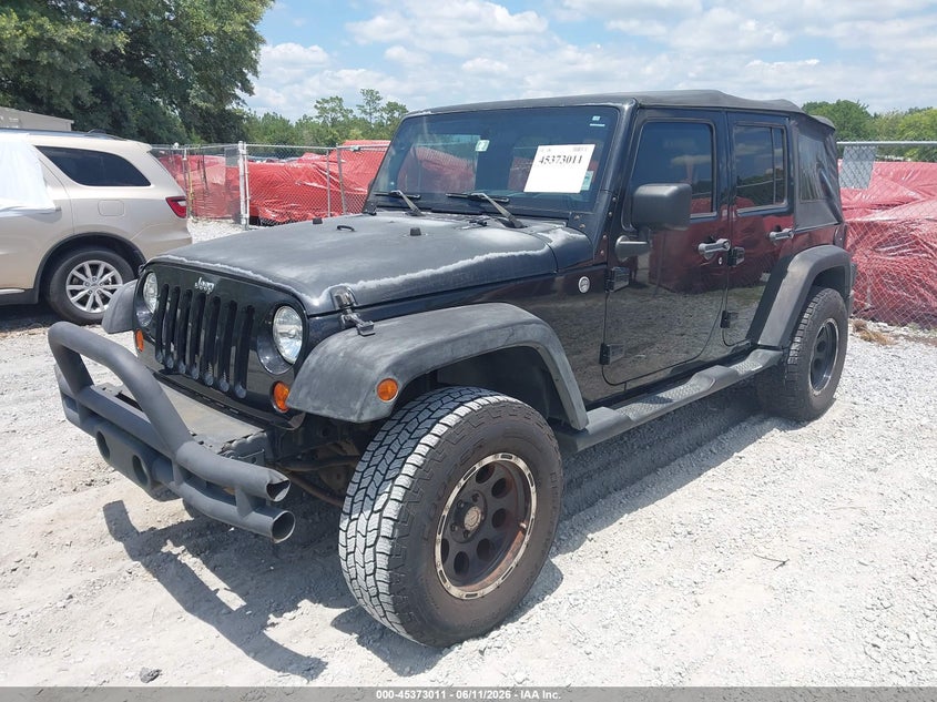 2010 Jeep Wrangler Unlimited Sport 1J4BA3H14AL127011 photo 1