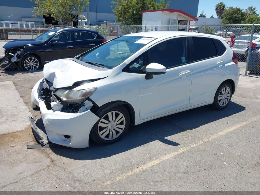 2016 Honda Fit Lx JHMGK5H55GX024932 photo 1