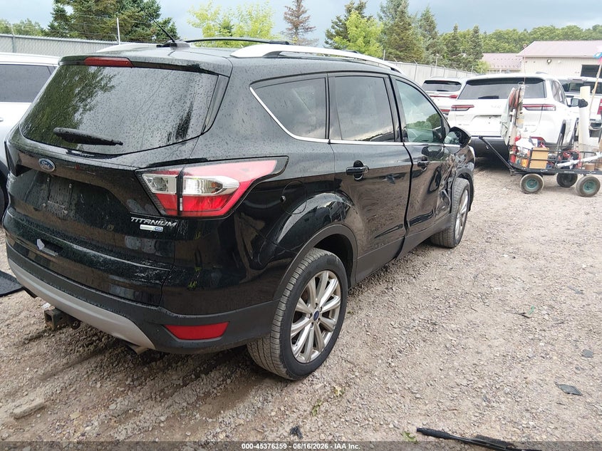 VIN 1FMCU9J97HUD86547 2017 FORD ESCAPE TITANIUM