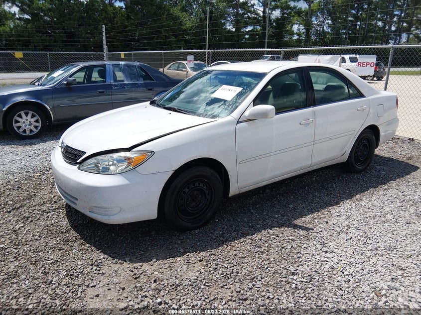 2002 Toyota Camry Le 4T1BE32K02U085925 photo 1