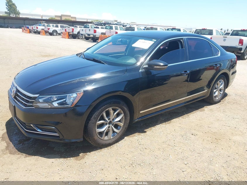 2016 Volkswagen Passat 1.8t S 1VWAT7A37GC042636 photo 1