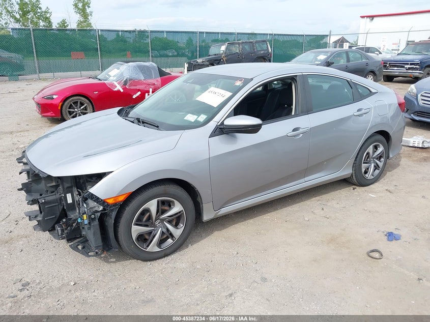 2HGFC2F6XKH580642 2019 Honda Civic Lx photo 1